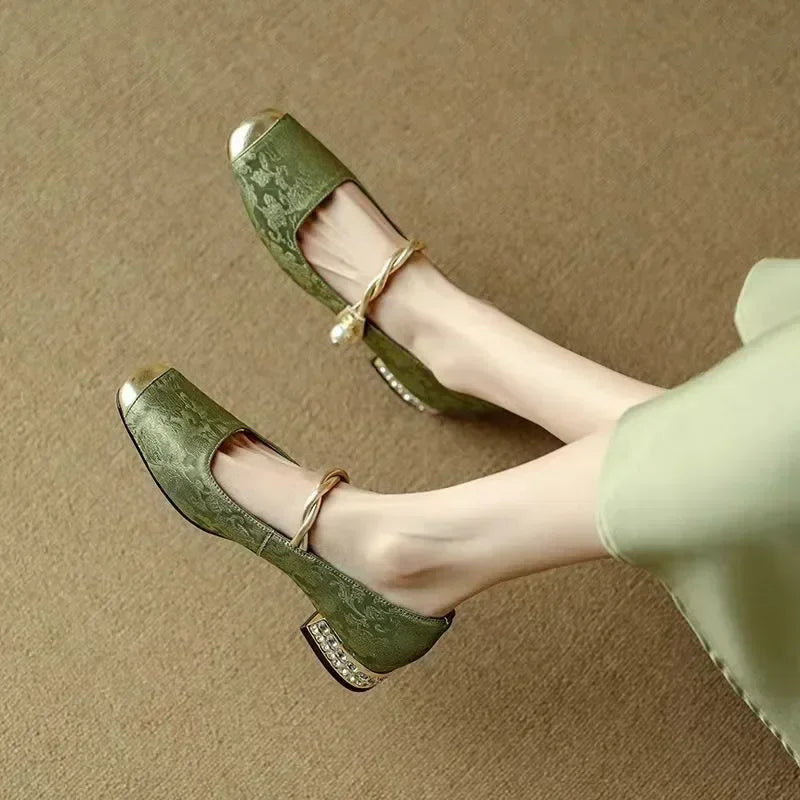Women's elegant square toe pumps with a sophisticated studded heel, comfortable party heels.