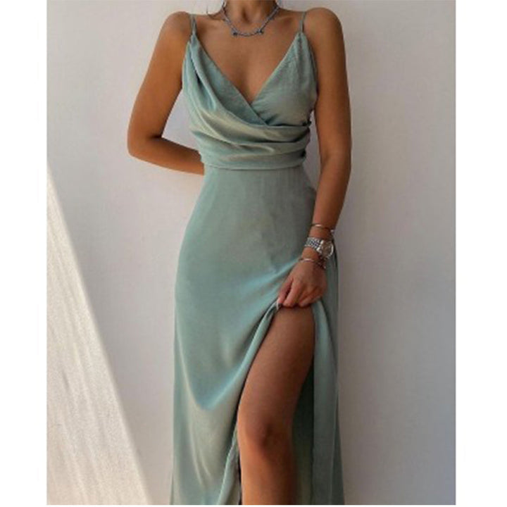 Women's sophisticated spaghetti strap maxi dress. V-neck, flowy fabric, ideal for special occasions & evening gowns.