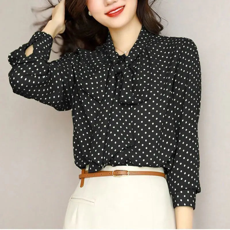 Chic women's elegant bow-accent blouse, a sophisticated long sleeve top perfect for any occasion.