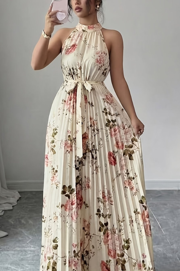 Flowy pleated halter neck maxi dress for women, offering an elegant and comfortable summer vacation style.