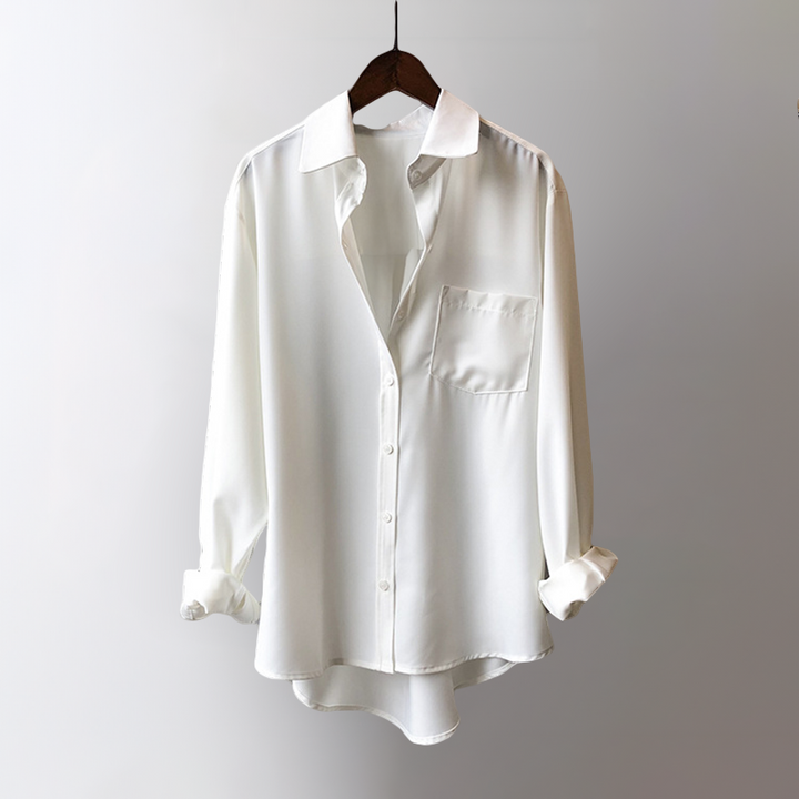 Elegant high-low blouse for women. Flowy long sleeve top, chic & versatile for modern fashion.