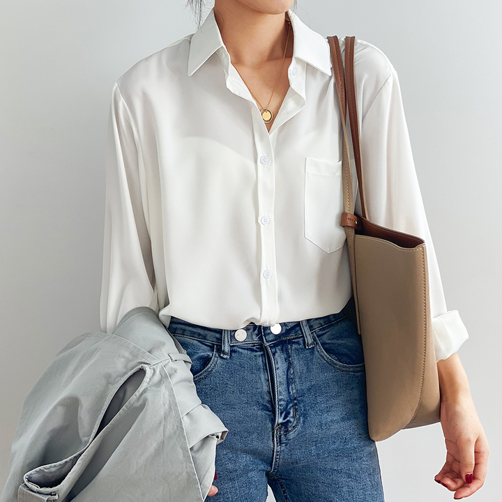 New arrival elegant women's high-low blouse. Flowy long sleeve top for chic & comfortable style.
