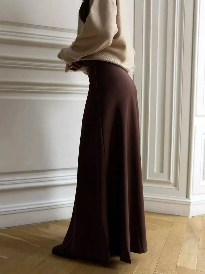 Sophisticated high waist fishtail maxi skirt, an elegant women's choice for evening events.