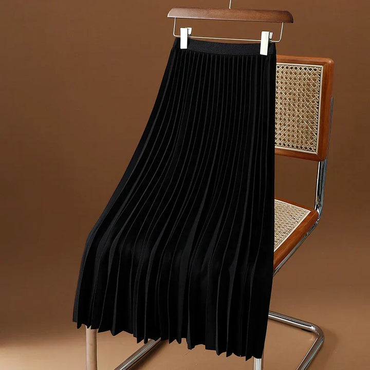 Elegant & versatile women's high-waist pleated midi skirt, a timeless addition to any wardrobe.