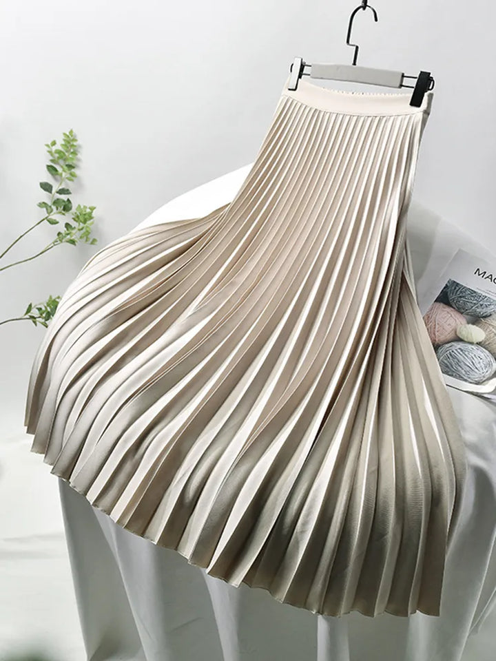 Feminine pleated midi skirt for women, high-waisted for a chic and timeless fashion statement.