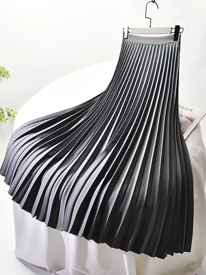 Timeless women's high-waist pleated midi skirt, offering an elegant & versatile style.