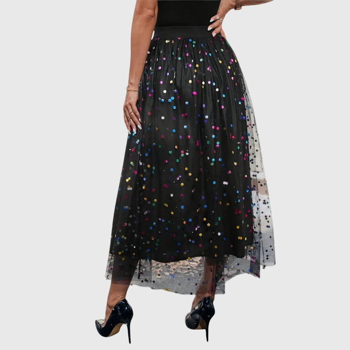 Glamorous sequin & tulle high waist midi skirt with an elegant asymmetric hem, ideal for women's party fashion.