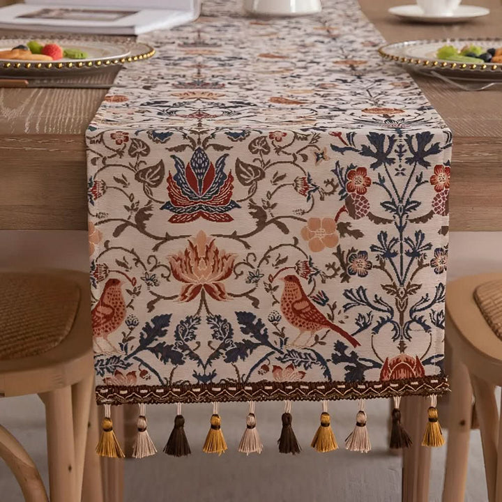 Vintage style microfiber table runner, fringed, featuring a beautiful floral bird design.