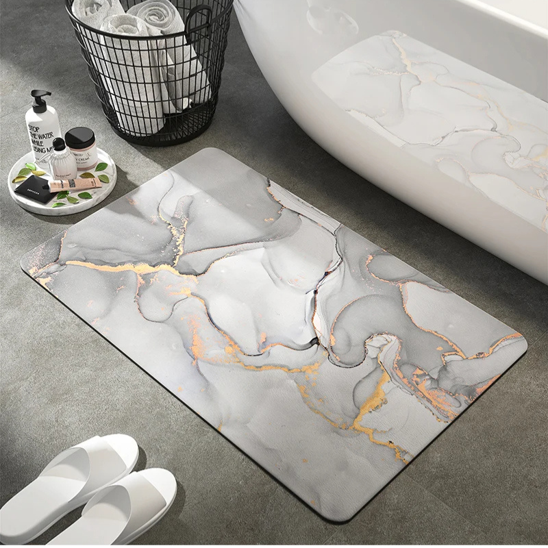 Luxury quick-dry bath mat with elegant marble pattern. Non-slip, absorbent & eco-friendly for modern bathrooms.