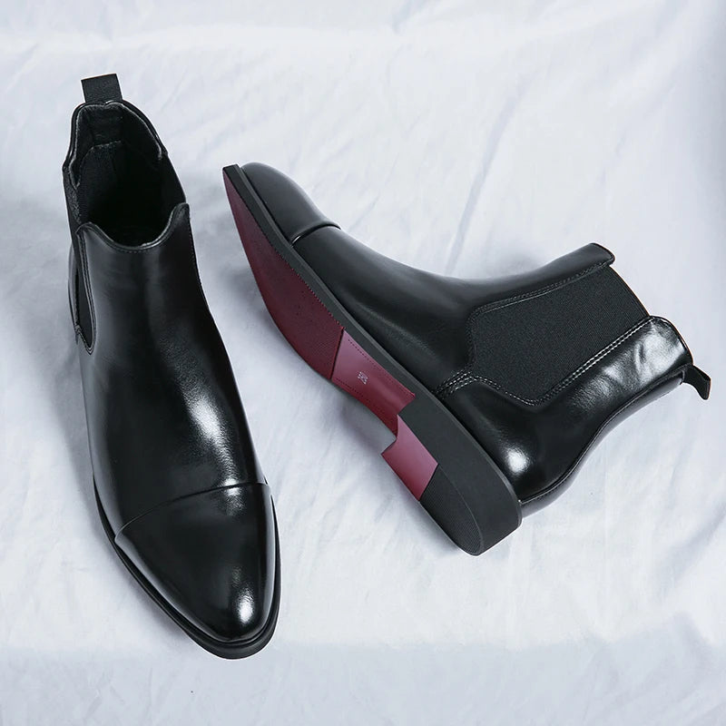 Elegant men's black slip-on ankle boots for modern style; comfortable & versatile dress footwear.
