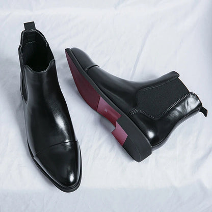 Elegant men's black slip-on ankle boots for modern style; comfortable & versatile dress footwear.