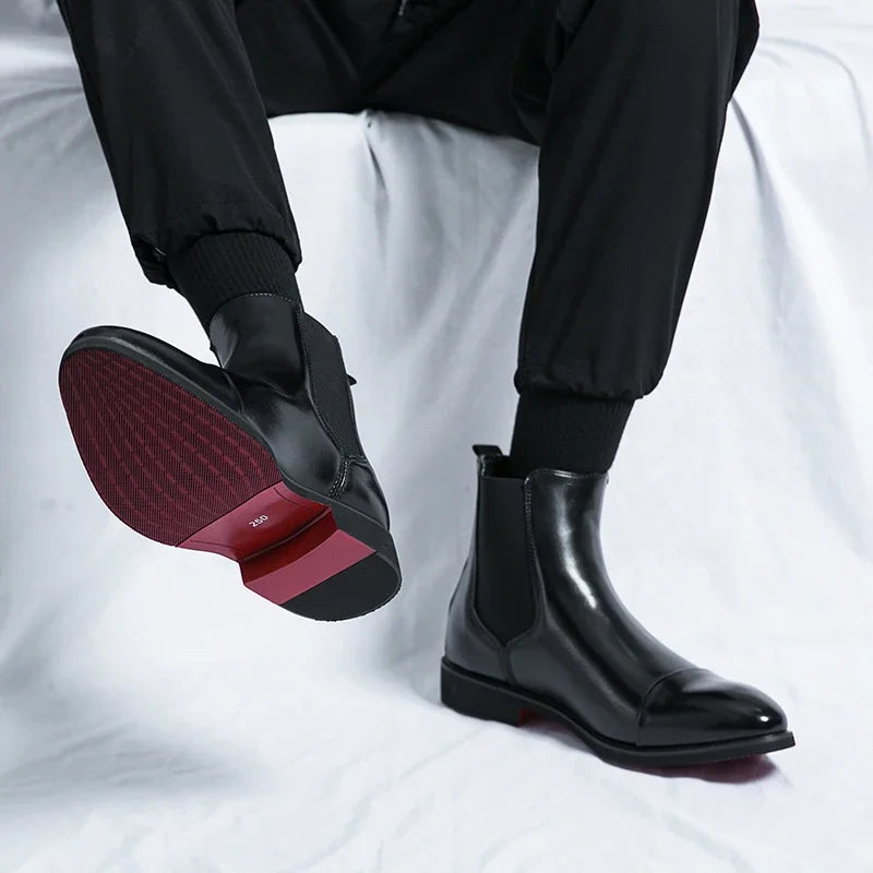 Stylish black men's slip-on ankle boots, perfect for modern everyday comfort & versatile fashion.