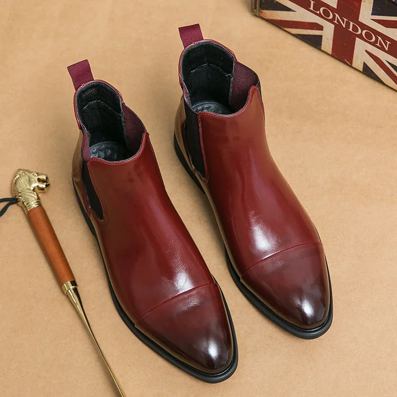 Easy-wear slip-on men's black ankle boots, offering elegant style and comfort for modern fashion.