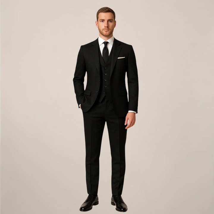 Tailored men's three-piece formal suit featuring a sophisticated contrast lapel for a sharp, elegant look.