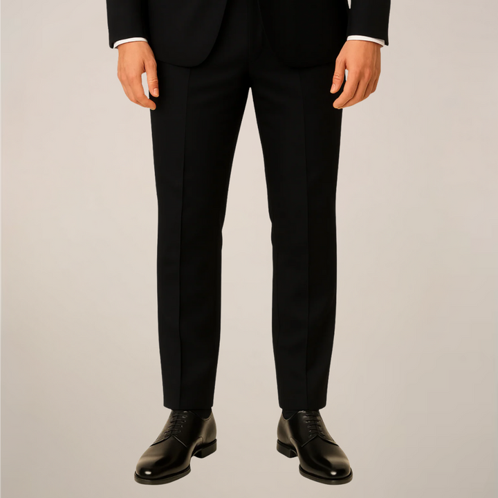 Complete men's three-piece dinner suit, black with a contrast lapel, ideal for special occasions and elegant wear.