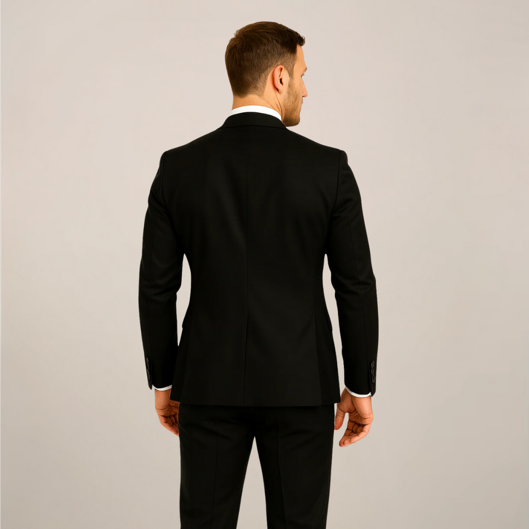Stylish men's black tie three-piece suit, featuring a modern contrast lapel, ideal for formal and elegant events.