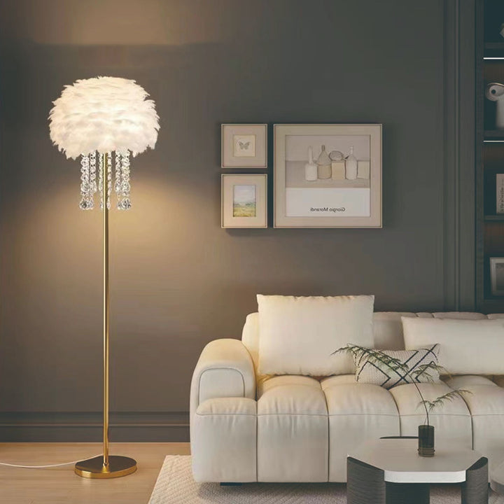 Decorative feather & crystal floor lamp providing soft ambient light for elegant Nordic home interiors.