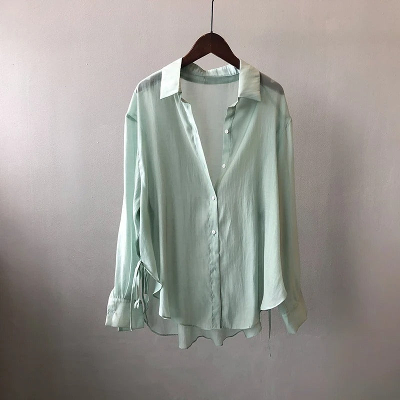 Chic NOVA ladies' blouse with a flowy design, elegant long sleeves, suitable for everyday fashion.