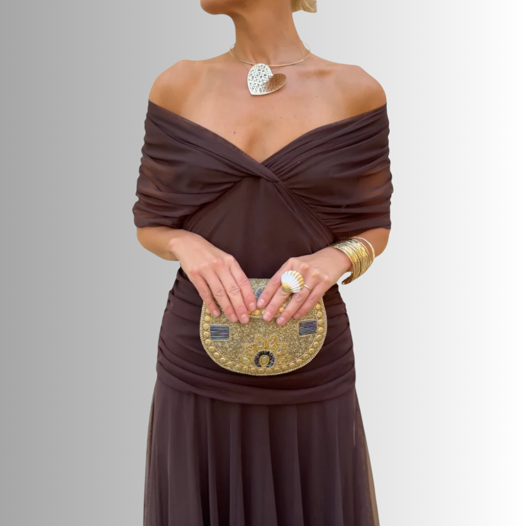 Elegant off-shoulder evening maxi dress for women, perfect for special occasions & formal events.