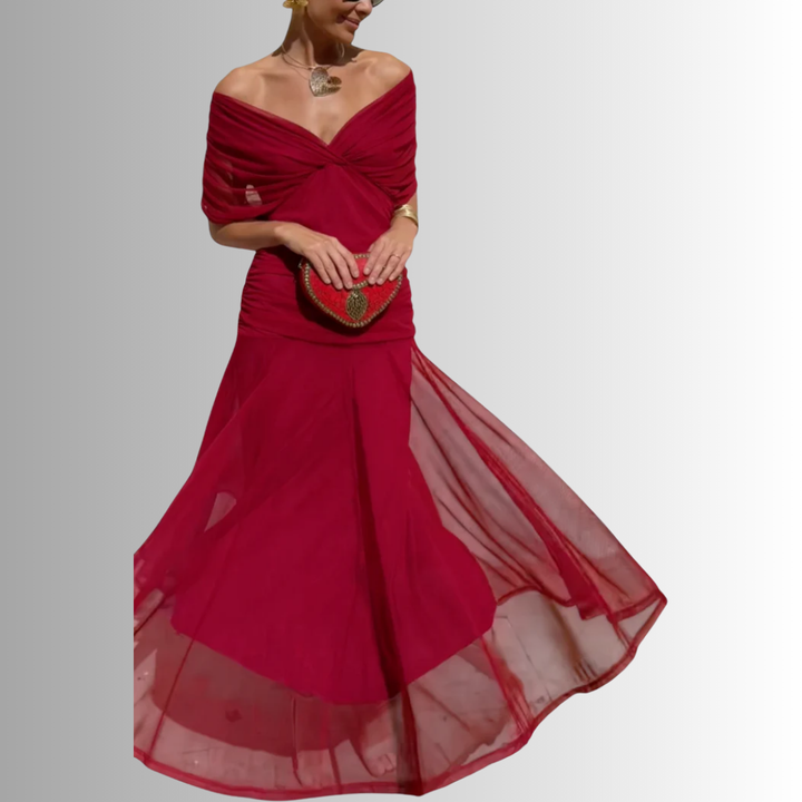 Stylish women's off-shoulder maxi dress, suitable for evening, party, or wedding guest attire.