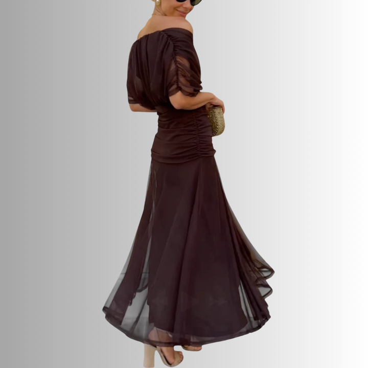 Women's elegant off-shoulder party maxi dress, perfect as a wedding guest or gala outfit.