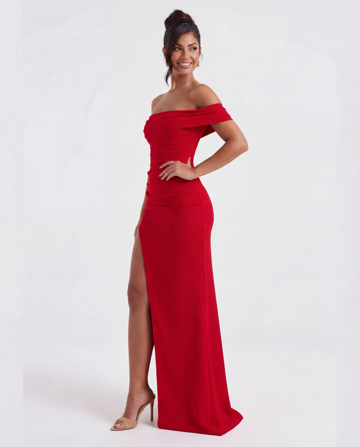 Figure-flattering off-shoulder ruched bodycon maxi dress. Elegant women's evening gown for formal occasions.