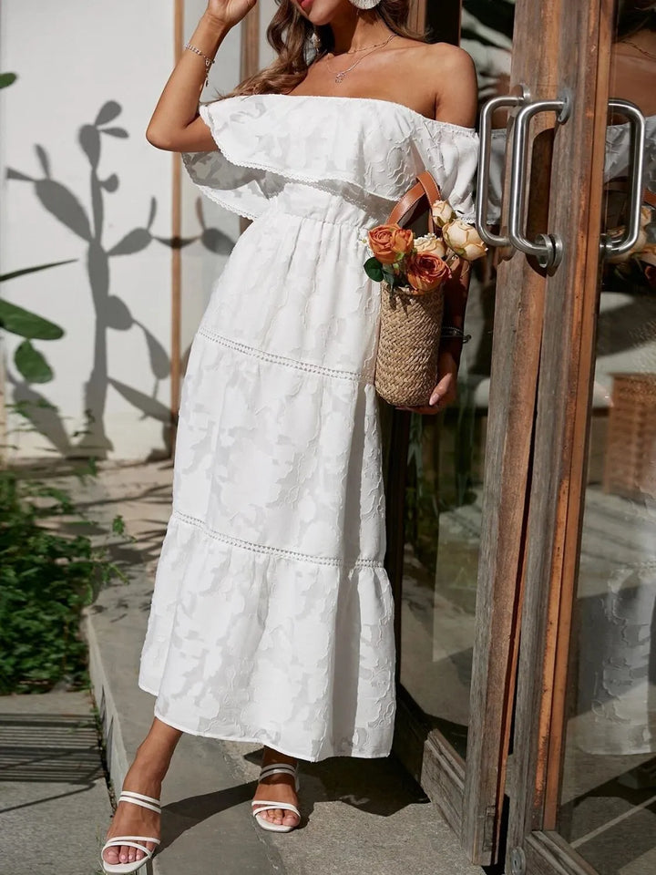 Stunning off-shoulder formal maxi dress, tiered ruffles & elegant design for special occasions.