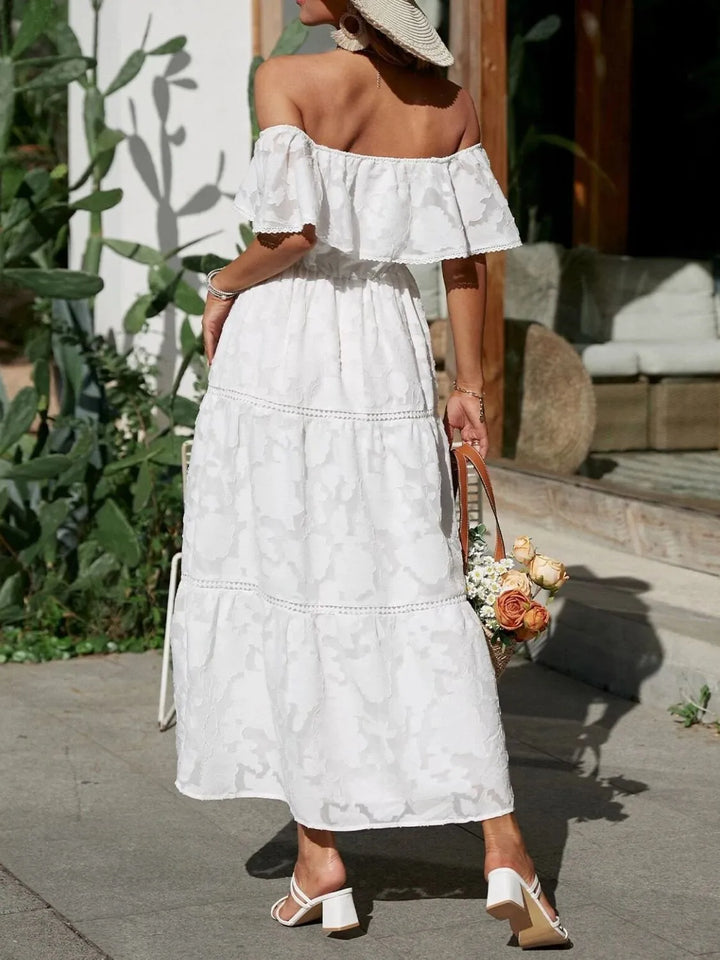 Chic women's off-shoulder tiered maxi dress, a perfect wedding guest outfit with ruffle details.