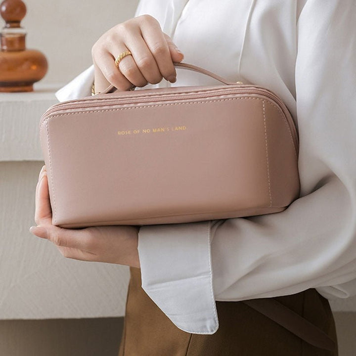 Practical & chic women's makeup organizer bag, ideal for travel, storing cosmetics & beauty essentials.