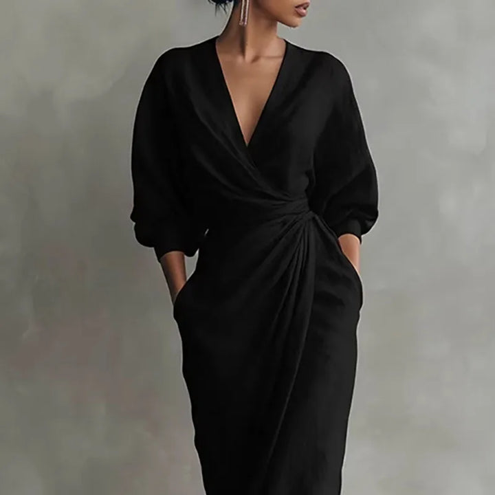Chic long sleeve V-neck wrap maxi dress for women in black, offering versatile elegant style.