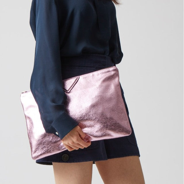 Versatile pink vegan leather purse for women, a stylish shoulder bag perfect for everyday elegance.