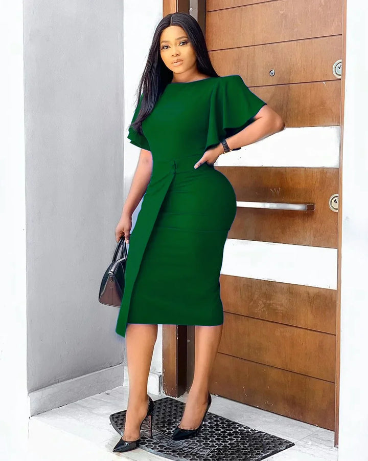 Stylish purple plus-size long sleeve fall dress for women. Elegant midi length with a sophisticated split skirt.