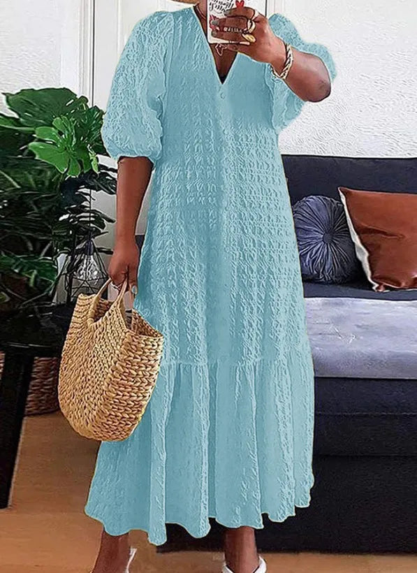 Elegant plus size V-neck maxi dress for women, flattering fit & chic style. Perfect for any occasion.