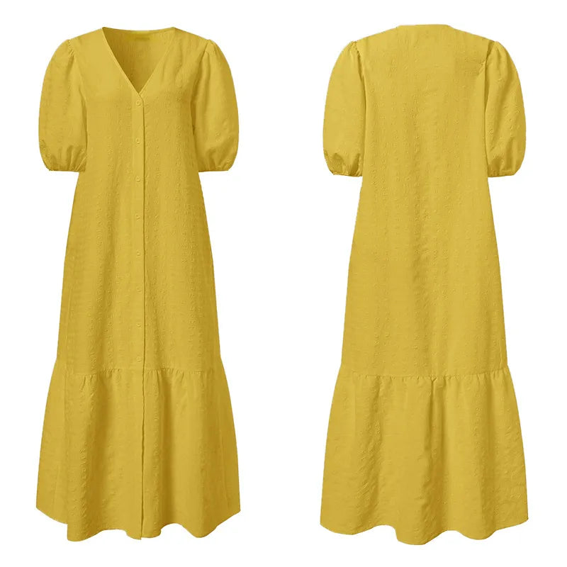 V-neck plus size women's maxi dress with sophisticated button details. Versatile for casual or formal wear.