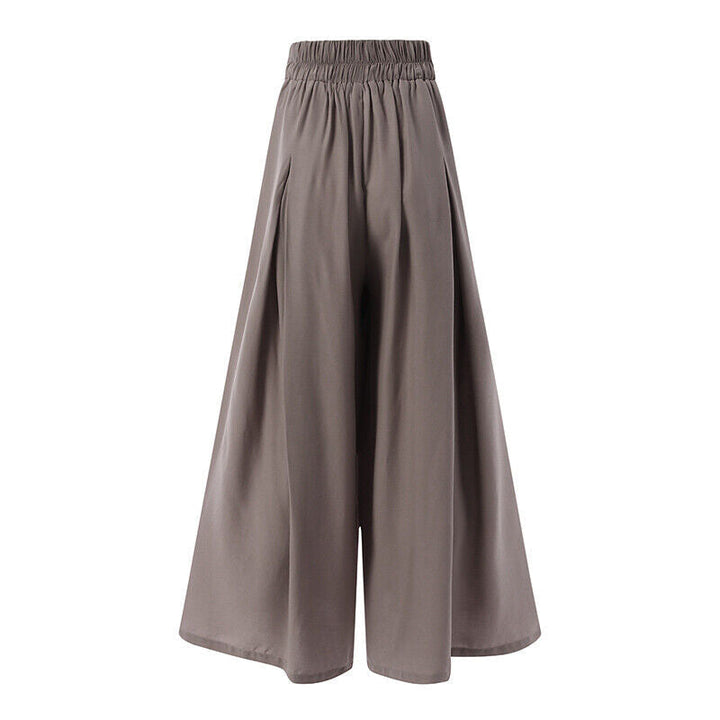 Flowing wide leg of comfortable plus-size palazzo pants, elegant and stylish workwear.