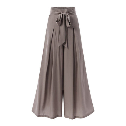 Neatly folded plus-size wide-leg formal trousers, emphasizing quality & comfort.