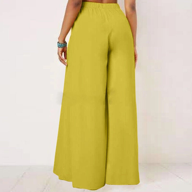 Back view of high-waist plus-size wide-leg pants, flattering & comfortable fit.