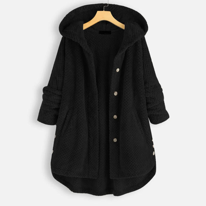 Chic oversized plus size winter jacket for women, hooded & warm outerwear.