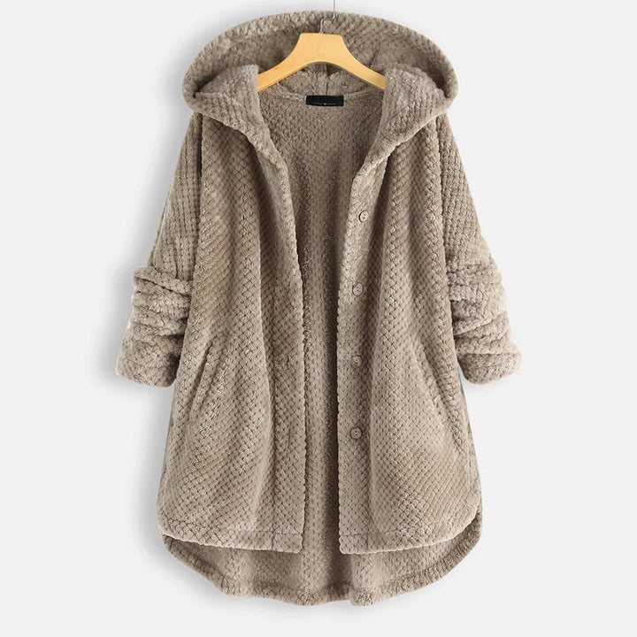 Elegant women's plus size hooded winter jacket, oversized fit, ideal for cold.