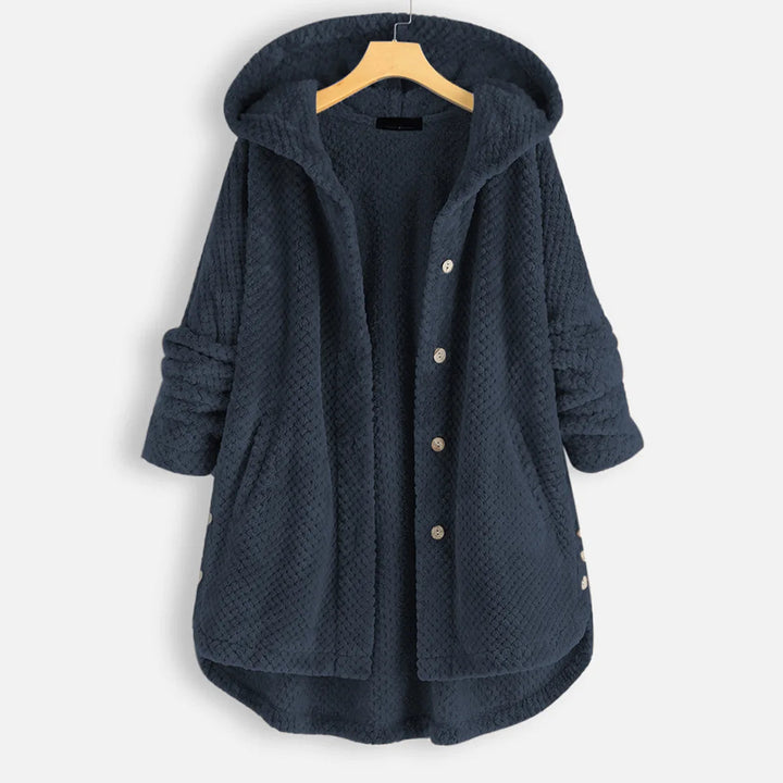 Chic plus size ladies' winter coat, hooded and warm, perfect for cold weather.