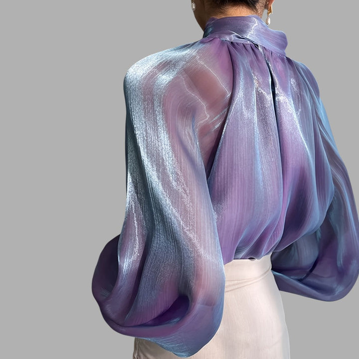 Stylish silver puff sleeve blouse for women, a versatile top for casual or elegant fashion.