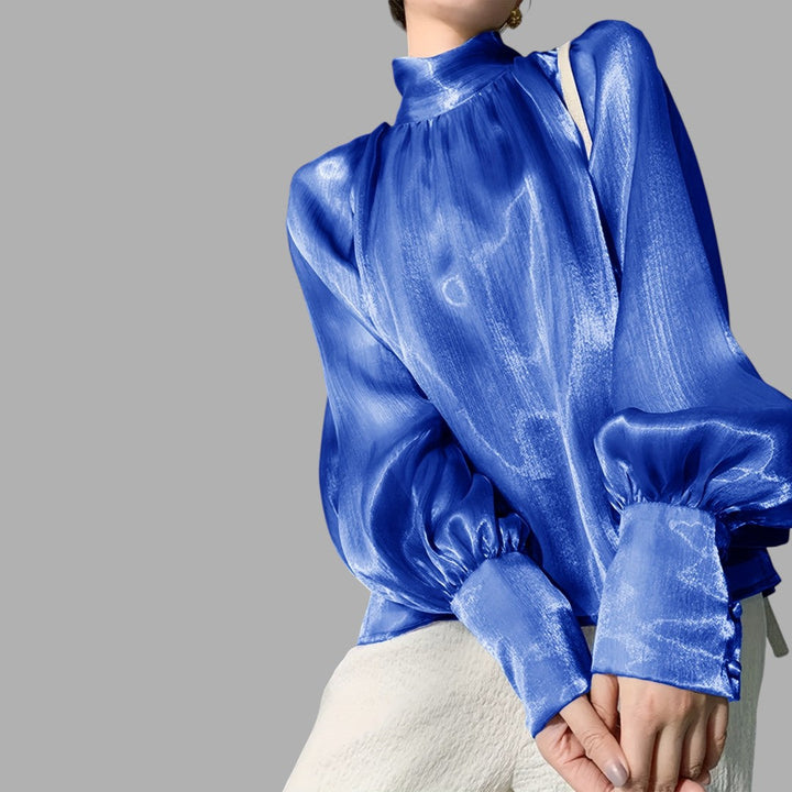 Sophisticated purple puff sleeve blouse, a stylish women's top for elegant and versatile fashion.