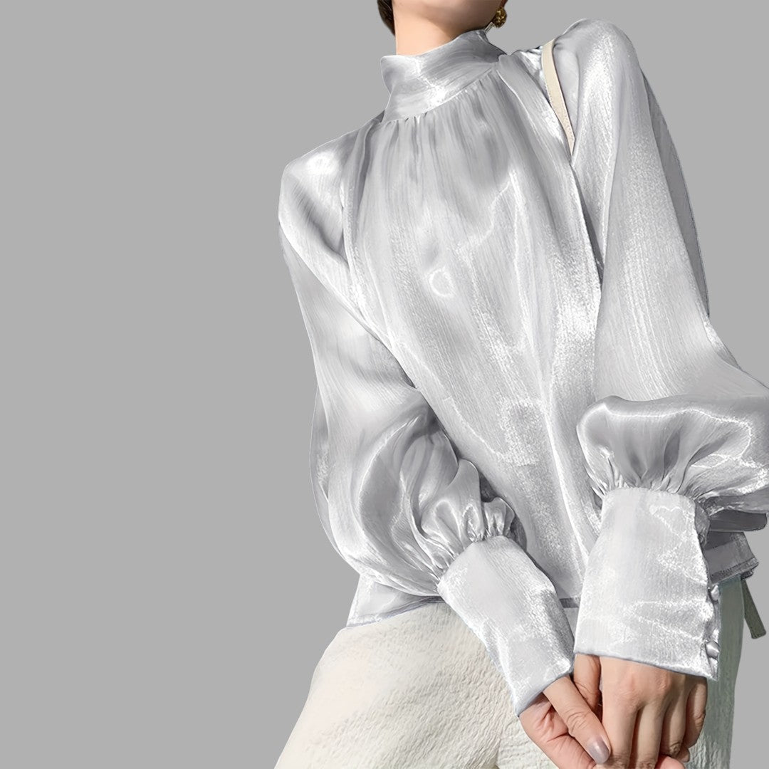 Beautiful women's purple puff sleeve blouse, an elegant and stylish top for work or casual fashion.