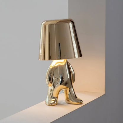 Soft glow dimmable LED table lamp, rechargeable for cozy bedroom ambiance and home decor.
