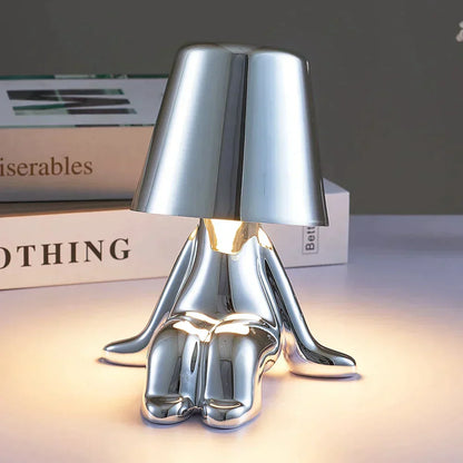Contemporary elegant LED table lamp, a cordless, dimmable home lighting solution.