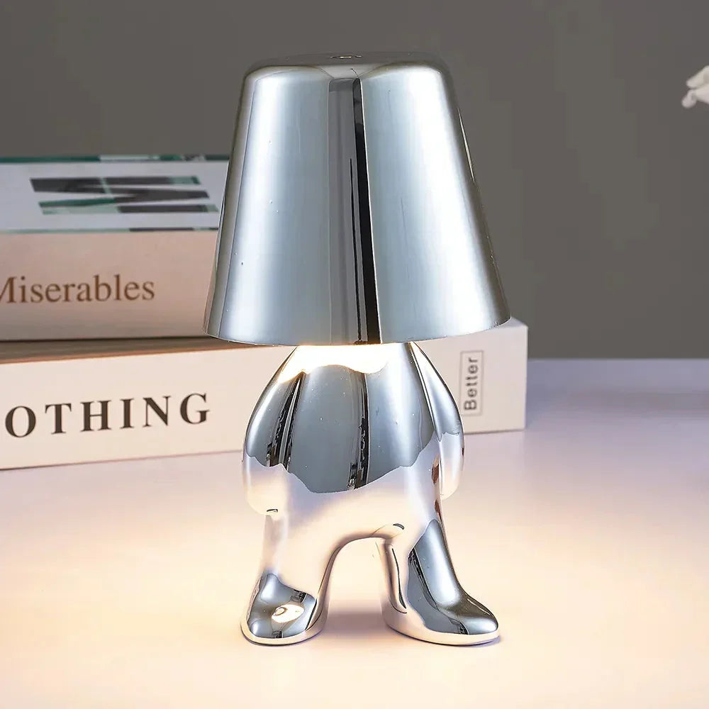 Portable LED table lamp, rechargeable for flexible home lighting and atmospheric ambiance.