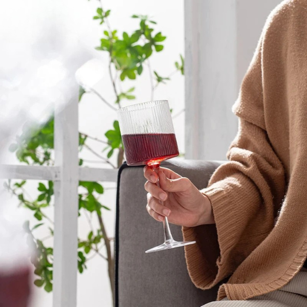Luxury ribbed glass tumbler, ideal for an elegant drinkware collection.