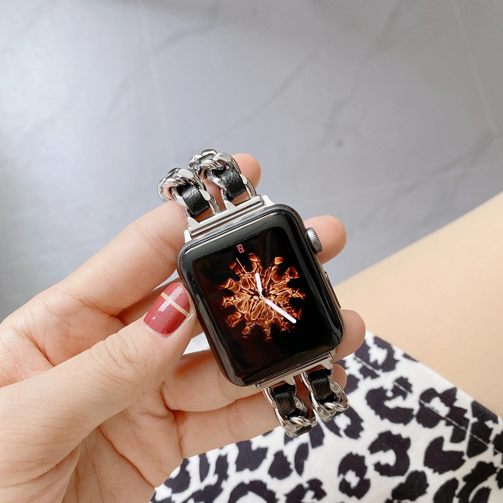 Adjustable gold chain link smartwatch band, women's elegant jewelry-style accessory.