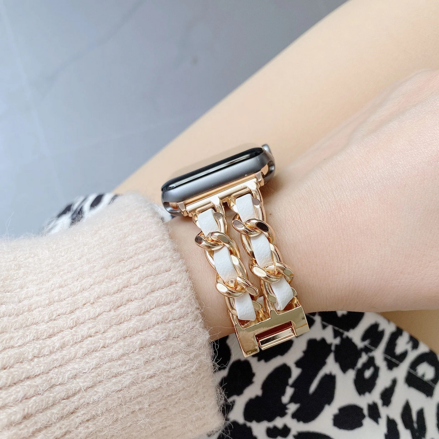 Gold chain link smartwatch band, women's jewelry-style wristband, elegant & secure.
