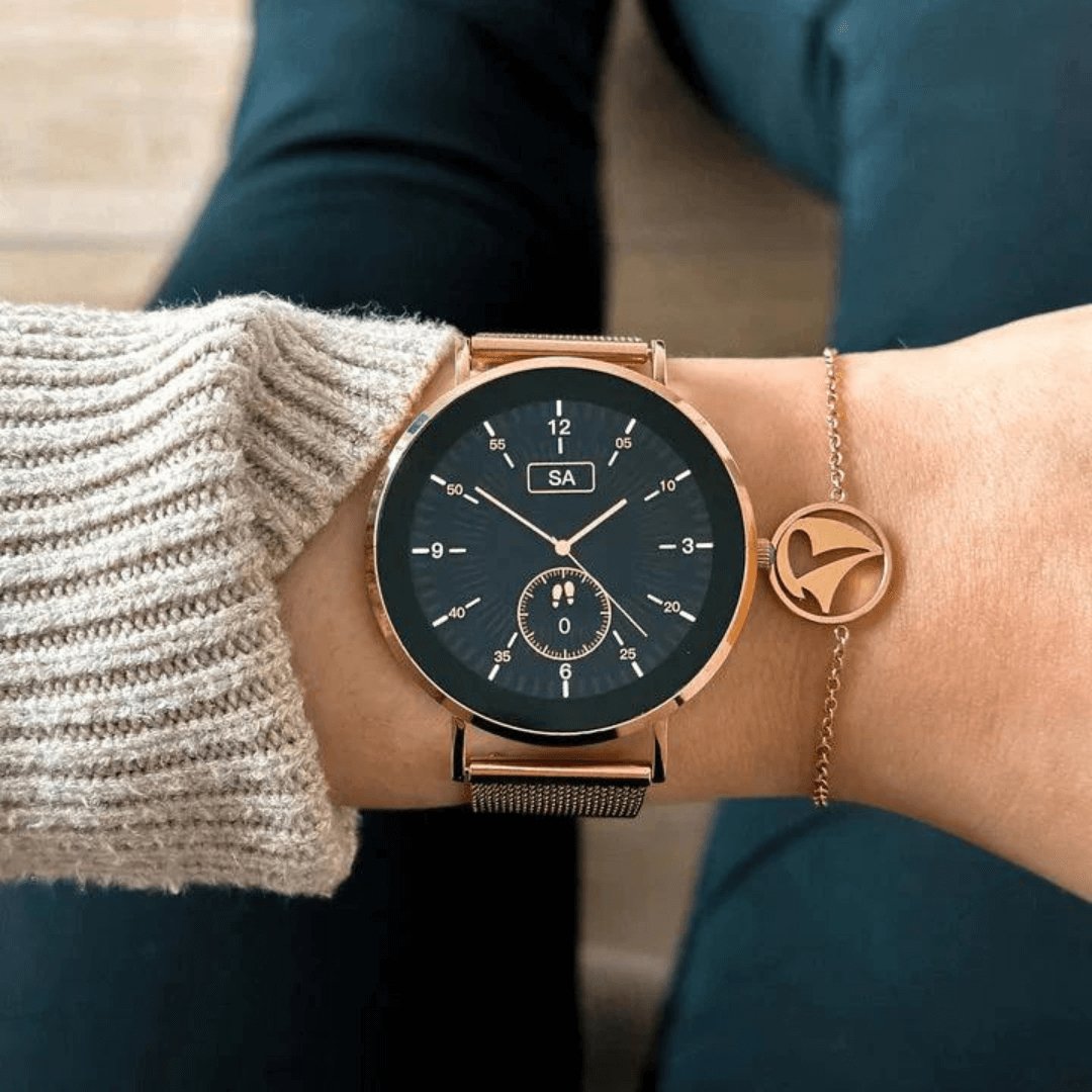 Silver women's smartwatch, smart health & fitness monitor. Modern activity tracker & wellness tech.